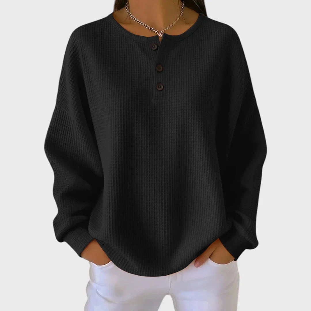 Helga - Oranger Pullover aus weichem Waffelstrick in Schwarz