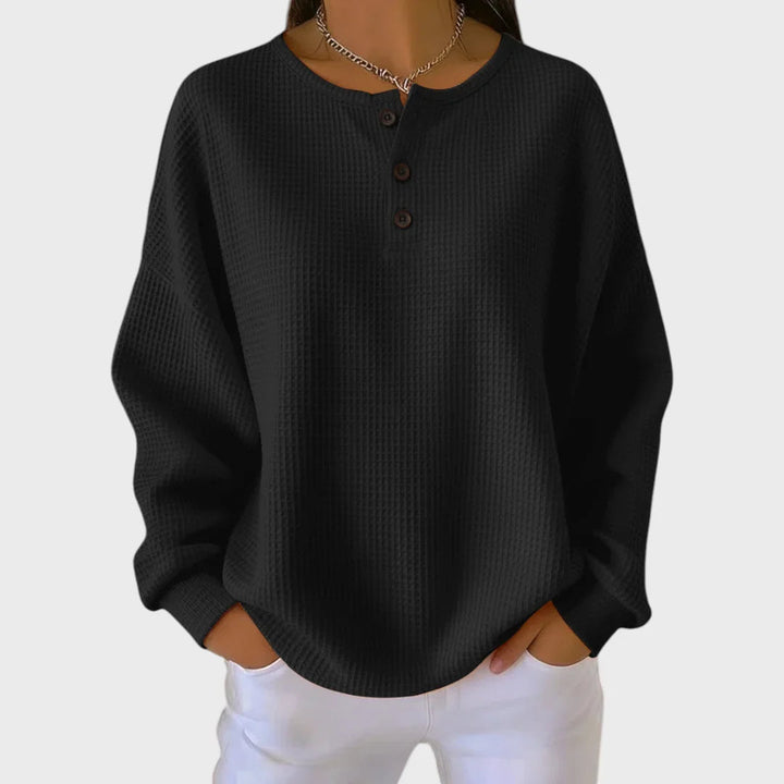 Helga - Oranger Pullover aus weichem Waffelstrick in Schwarz